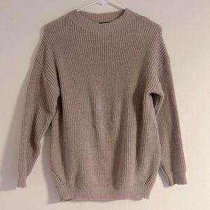 Very light colored mauve sweater